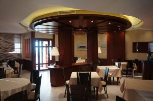 Een restaurant of ander eetgelegenheid bij Hotel Primavera