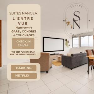 ナンシーにあるL 'entre Vue - Nancy Gare Congrès - 6 Pers - Parkingのソファとテレビのあるリビングルーム