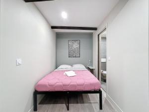 En eller flere senge i et værelse på Appartement tout neuf 4 pers N6