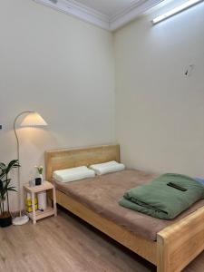 Postel nebo postele na pokoji v ubytování panda