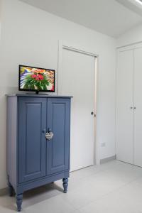 TV a/nebo společenská místnost v ubytování Appartamenti San Francesco