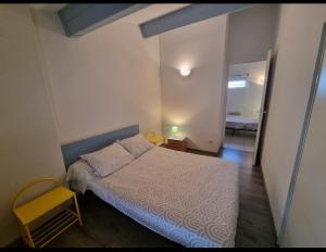 En eller flere senge i et værelse på À 50m de la plage, emplacement idéal, spacieuse maison, 3 grandes chambres 6 couchages, devant la grande plage