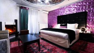 Postel nebo postele na pokoji v ubytování Eliton Hotel & Spa
