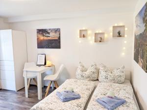 Postel nebo postele na pokoji v ubytování B1 - Urlaubsmagie - Einzimmerwohnung direkt am Wanderweg