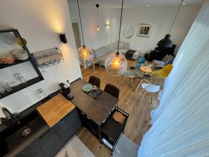 an aerial view of a living room and dining room at Borgo Garda in Peschiera del Garda