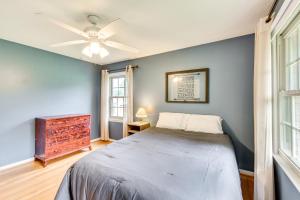 a bedroom with a bed and a ceiling fan at West Union Home with Saltwater Pool on 2 Acres! in Walhalla +25 photos
