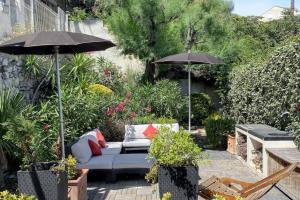 Vonkajšia záhrada v ubytovaní Maison chaleureuse au cœur des Calanques de Marseille + jardin.