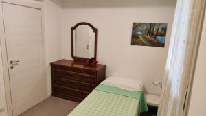 Postel nebo postele na pokoji v ubytování Residenza del Sole
