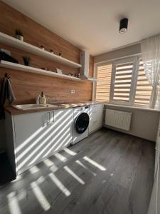 Kuchyň nebo kuchyňský kout v ubytování Apartamenti Jēkabpilī