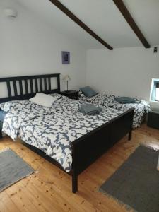 Postel nebo postele na pokoji v ubytování Villa Nono