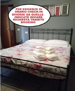 Postel nebo postele na pokoji v ubytování Mono CHECKIN A RICHIESTA