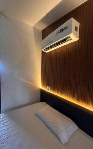 Ένα ή περισσότερα κρεβάτια σε δωμάτιο στο Nannai Beira Mar, Flat Duplex em Muro Alto - Porto de Galinhas +70 φωτογραφίες