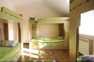 A bunk bed or bunk beds in a room at Almaty Backpackers