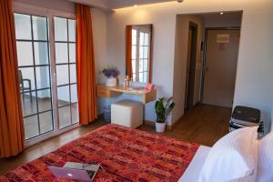 Posezení v ubytování Kronos Hotel