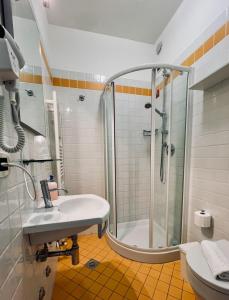 Koupelna v ubytování Hotel Al Fogo + 22 fotografií