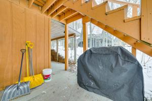a house being constructed with a construction site with asevere at Less Than 1 Mi to Nubs Nob Ski Cabin with Sauna and Deck! in Harbor Springs