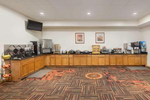 a large room with a counter and a room with a unintention at Best Western Red Hills in Kanab +30 photos