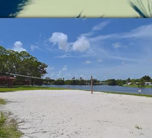 una playa de arena junto a un cuerpo de agua en 1233 Apartment 4 Miami, en Tamiami 5 fotos más