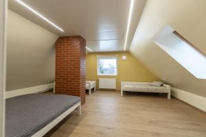 Postel nebo postele na pokoji v ubytování CozyStay