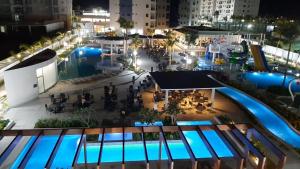 an overhead view of a pool at night at Ap SALINAS EXCLUSIVE RESORT in Salinópolis