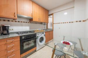 A kitchen or kitchenette at Apartamento Centro Santiago
