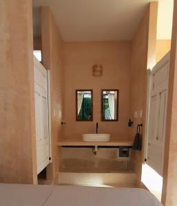 Postel nebo postele na pokoji v ubytování Guaya Hostel