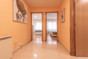A bed or beds in a room at Apartamento Centro Santiago