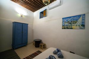 Postel nebo postele na pokoji v ubytování Riad bab merzouga