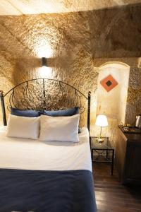 Ένα ή περισσότερα κρεβάτια σε δωμάτιο στο ROCA CAPPADOCIA