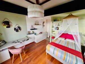 Voodi või voodid majutusasutuse OASIS Suite toas