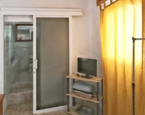 A television and/or entertainment centre at Exceptional Studio in Frontera | 25 sq.m. | Terrace