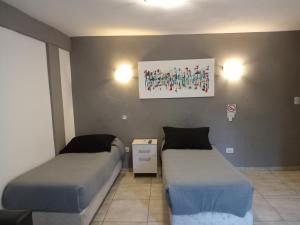 Postel nebo postele na pokoji v ubytování Hotel GBH