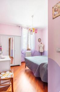 Ένα ή περισσότερα κρεβάτια σε δωμάτιο στο Serendipity