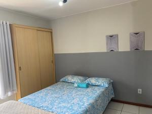 En eller flere senge i et værelse på Studio completo a 200m do shopping Iguatemi