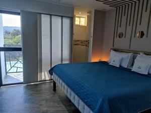 Letto o letti in una camera di Hotel Ocean Fusagasuga
