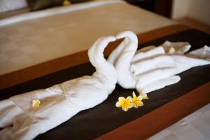 Postel nebo postele na pokoji v ubytování Munari Resort Ubud
