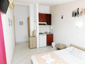 Kuchyň nebo kuchyňský kout v ubytování Katerina Studios + 54 fotografií