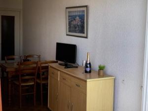 Televízia a/alebo spoločenská miestnosť v ubytovaní Résidence Héliopolis Bâtiment Ab - Studio 4 pers Héliopolis Bât AB très grande terrasse MAE-2984