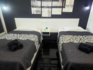 A bed or beds in a room at Sunset in Los Geranios by HelloApartments
