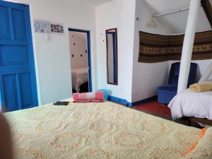 Postel nebo postele na pokoji v ubytování Posada Azul Cusco