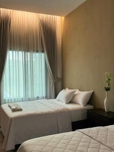 Postel nebo postele na pokoji v ubytování Hotel Margarita