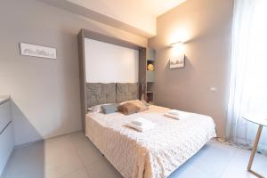 Posteľ alebo postele v izbe v ubytovaní Design Studio - Piazzale Lodi - Porta Romana