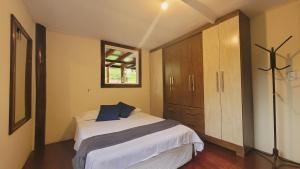 Postel nebo postele na pokoji v ubytování Sobrado Verde da Ale e do Thiago Ilha do Mel Encantadas