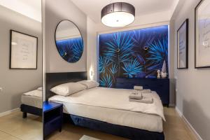Ένα ή περισσότερα κρεβάτια σε δωμάτιο στο Apartamenty u Maślanki