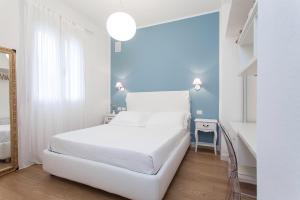 Postel nebo postele na pokoji v ubytování B&B Villa Celeste + 37 fotografií