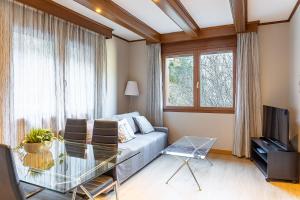 TV a/nebo společenská místnost v ubytování Escapada Natural con Parking, Vistas y Jardín