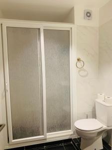 Koupelna v ubytování Appartement Vue Piscine et Mer