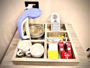 Fasilitas pembuat kopi dan teh di Pyramids View Rz