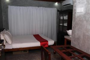 Giường trong phòng chung tại Executive Residency Retreat