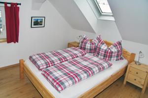 Ліжко або ліжка в номері Haus Auszeit
